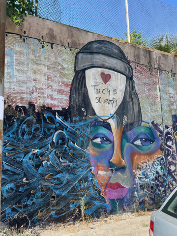 A graffiti/street art wall in the Jabal Al-Luweibdeh neighborhood