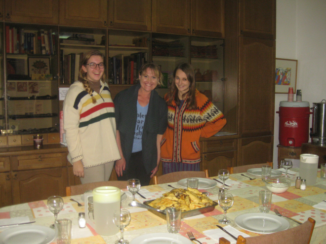 ACOR residents serve a communal dinner during the snowstorm. Photo by Dr. Barbara Porter