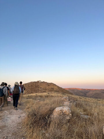 Wilfrid Laurier University students walking to the site at Khirbat al-Mukhayyat. (Photo by Miya Pletsas.)